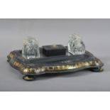 A 19th century papier mache mother of pearl inlaid ink stand, with heightened gilt decoration,