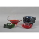 Four pieces of 20th century studio glass, comprising a large footed black moulded glass bowl,