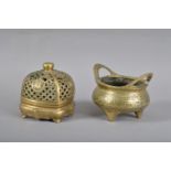 Two Chinese brass vessels, comprising a scent vessels with pierced cover, the cover with a finial