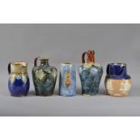 A collection of Royal Doulton and Doulton Lambeth items, comprising a small vase with a blue/grey
