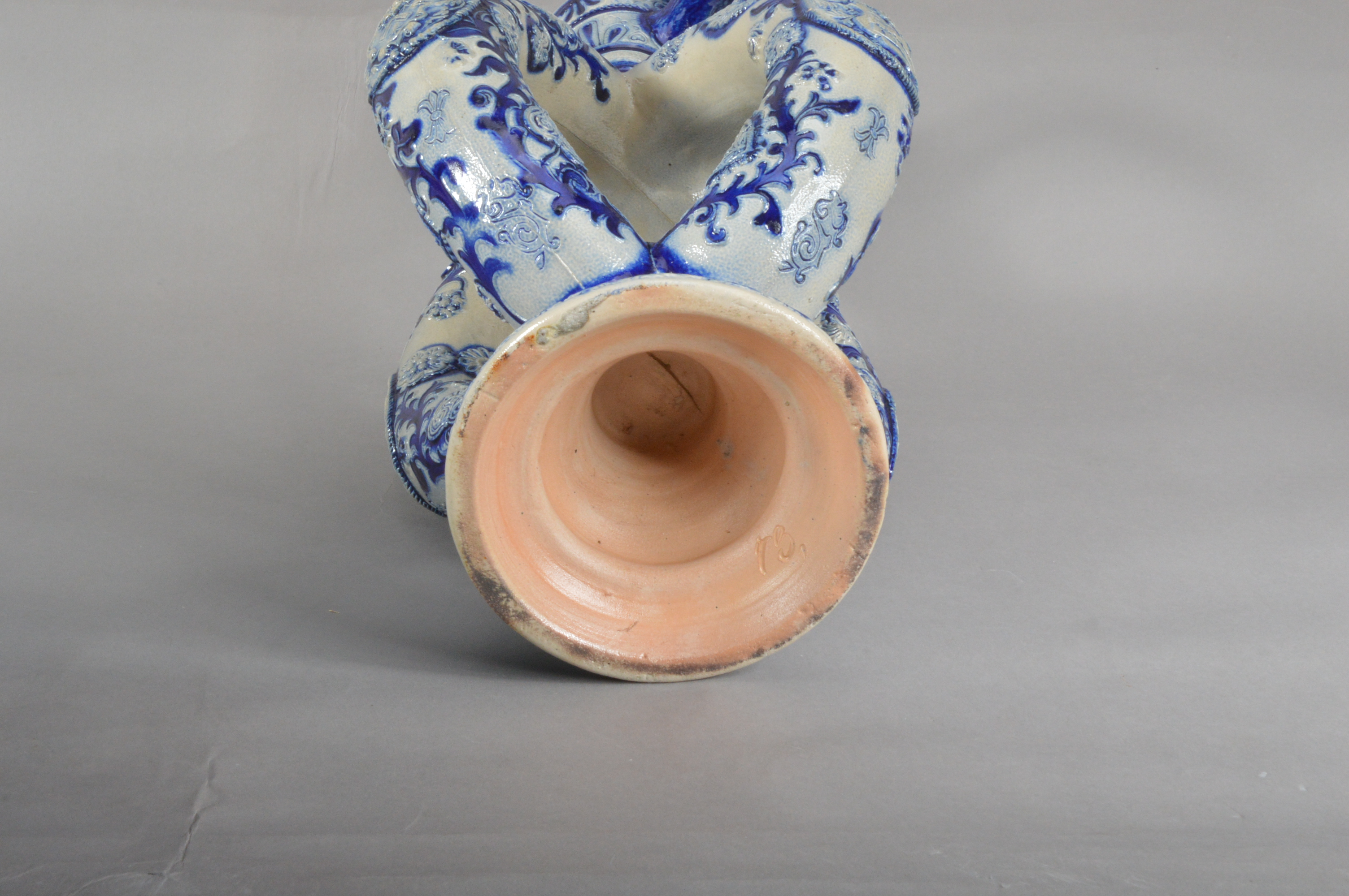 A German Westerwald salt-glazed stoneware ewer, blue and white raised decoration, a face below the - Image 5 of 5