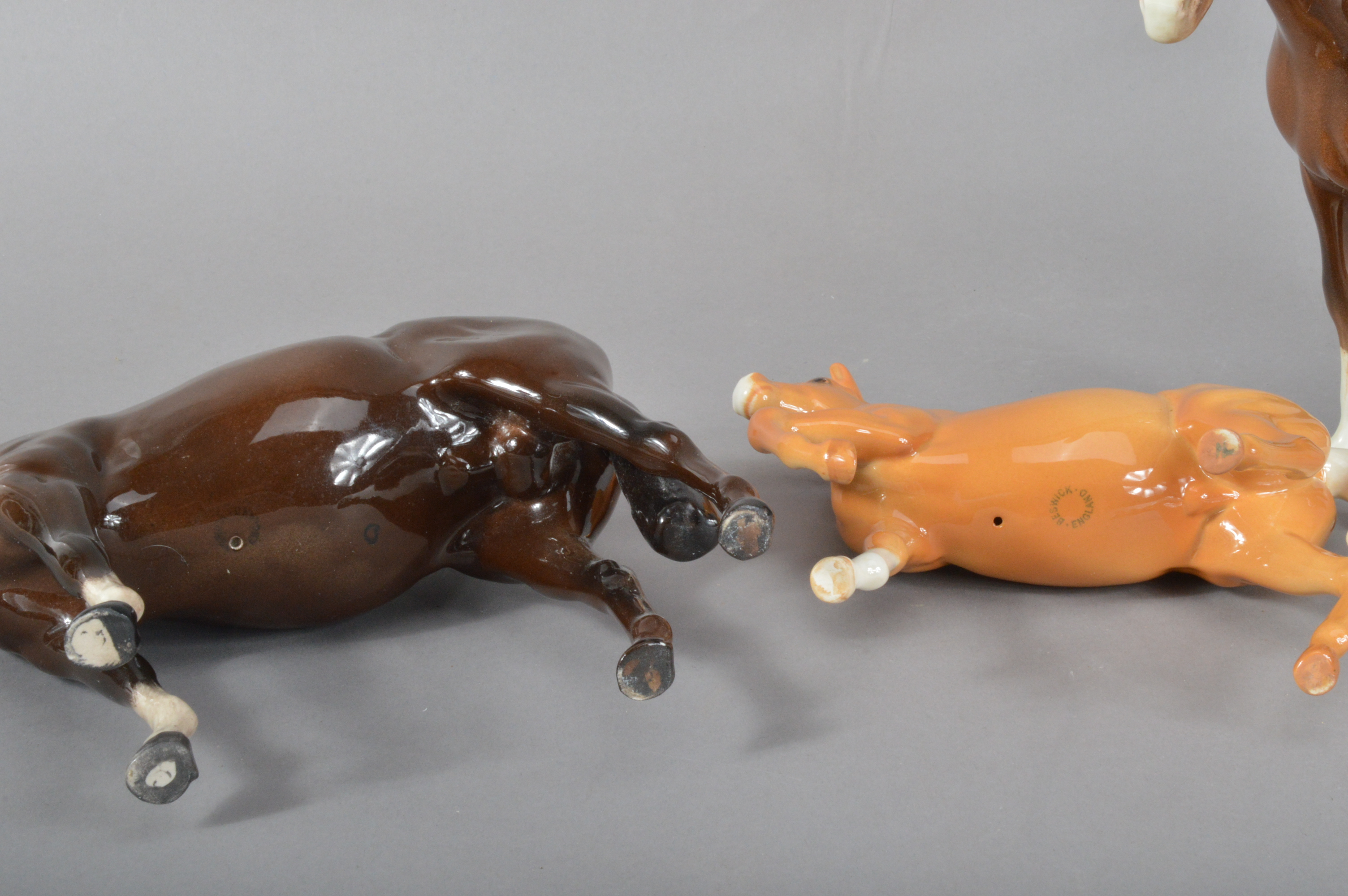 Four 20th century ceramic Beswick horses, two larger dark brown examples, the largest 21cm H x - Image 2 of 2