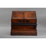 A 19th century burr walnut stationary box, lift open top doors, enclosing a fitted interior, pierced