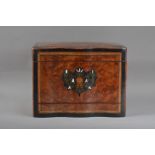 A regency burr walnut veneered ebonised and boxwood inlaid decanter box, the lift open top with