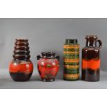 A collection of West German pottery items, comprising a stick stand, 41cm high, three vases, with