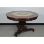 A 19th century rosewood and plaster inlaid circular hall table, possibly William IV, the circular