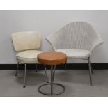 Three pieces of modern design furniture, comprising a rattan armchair 76cm H x 79cm W, a small