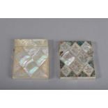 Two antique mother of pearl card cases, one with engraved floral design with green shell, the