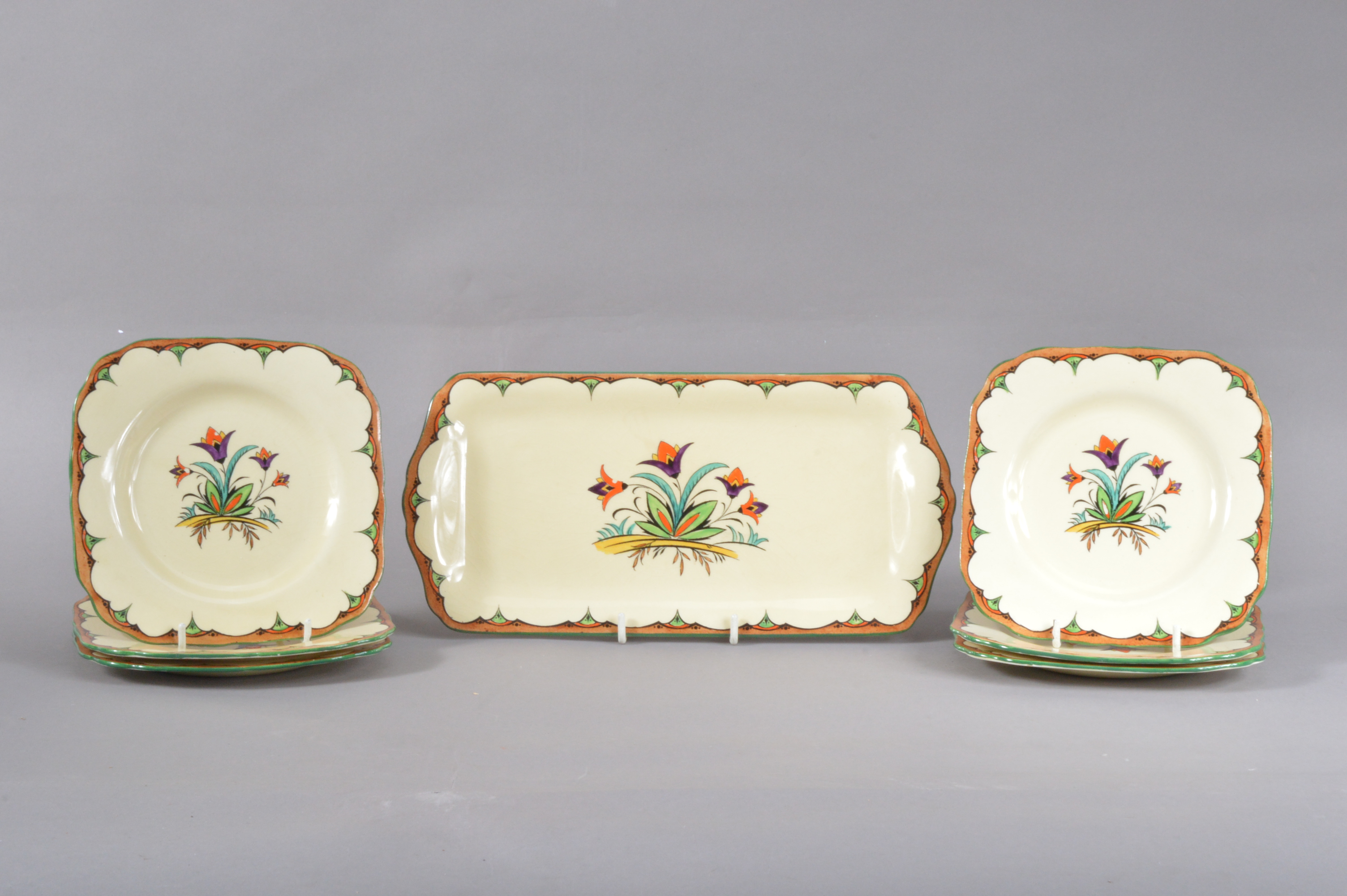 A 20th century art deco Minton ceramic sandwich set, comprising a large rectangular tray 29cm x