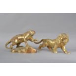 Two 20th century brass Far Eastern animal sculptures, comprising and roaring tiger and big cat on