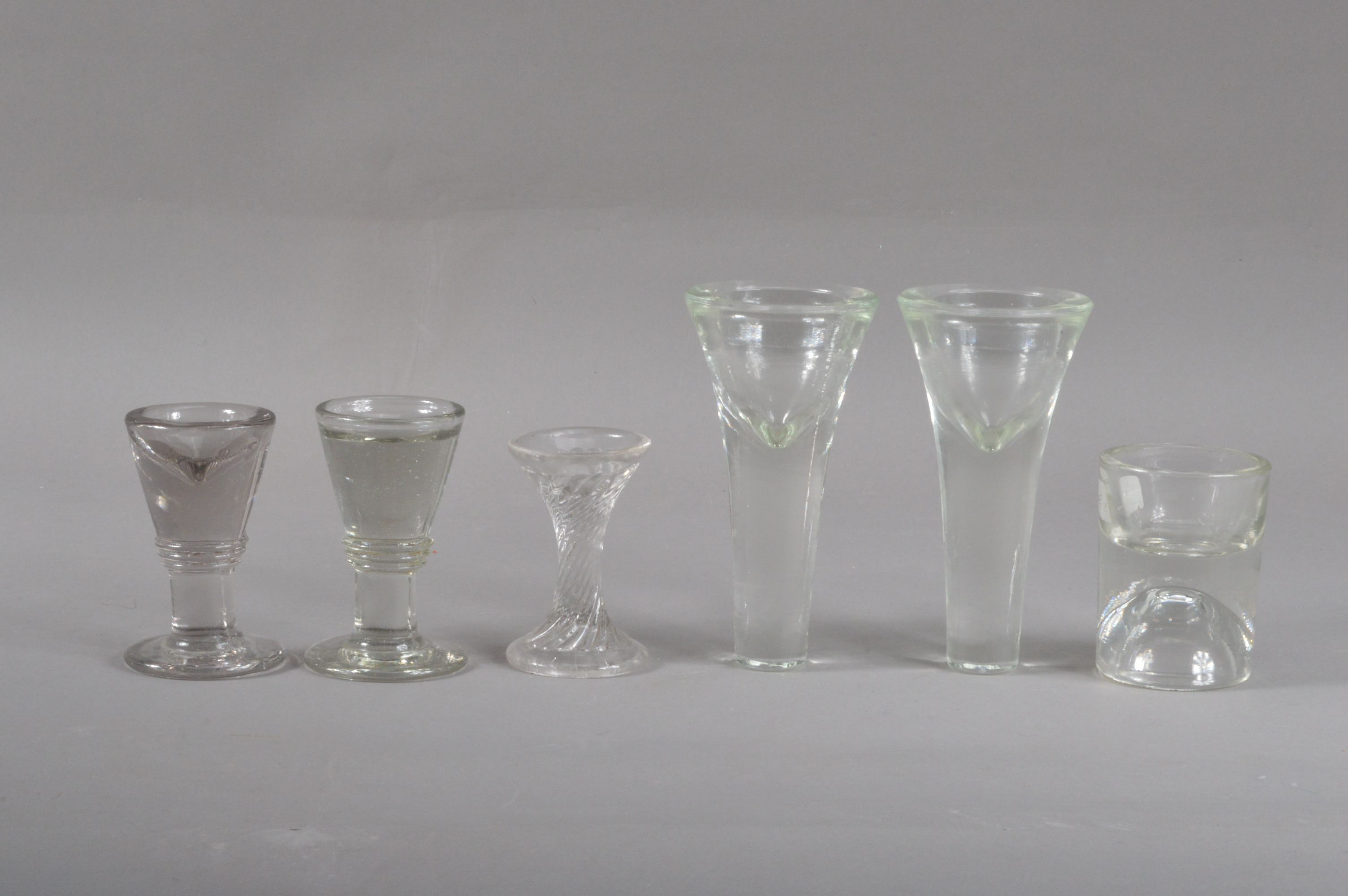 A collection of 19th century and later ice cream glasses, of varying styles and sizes, some lead