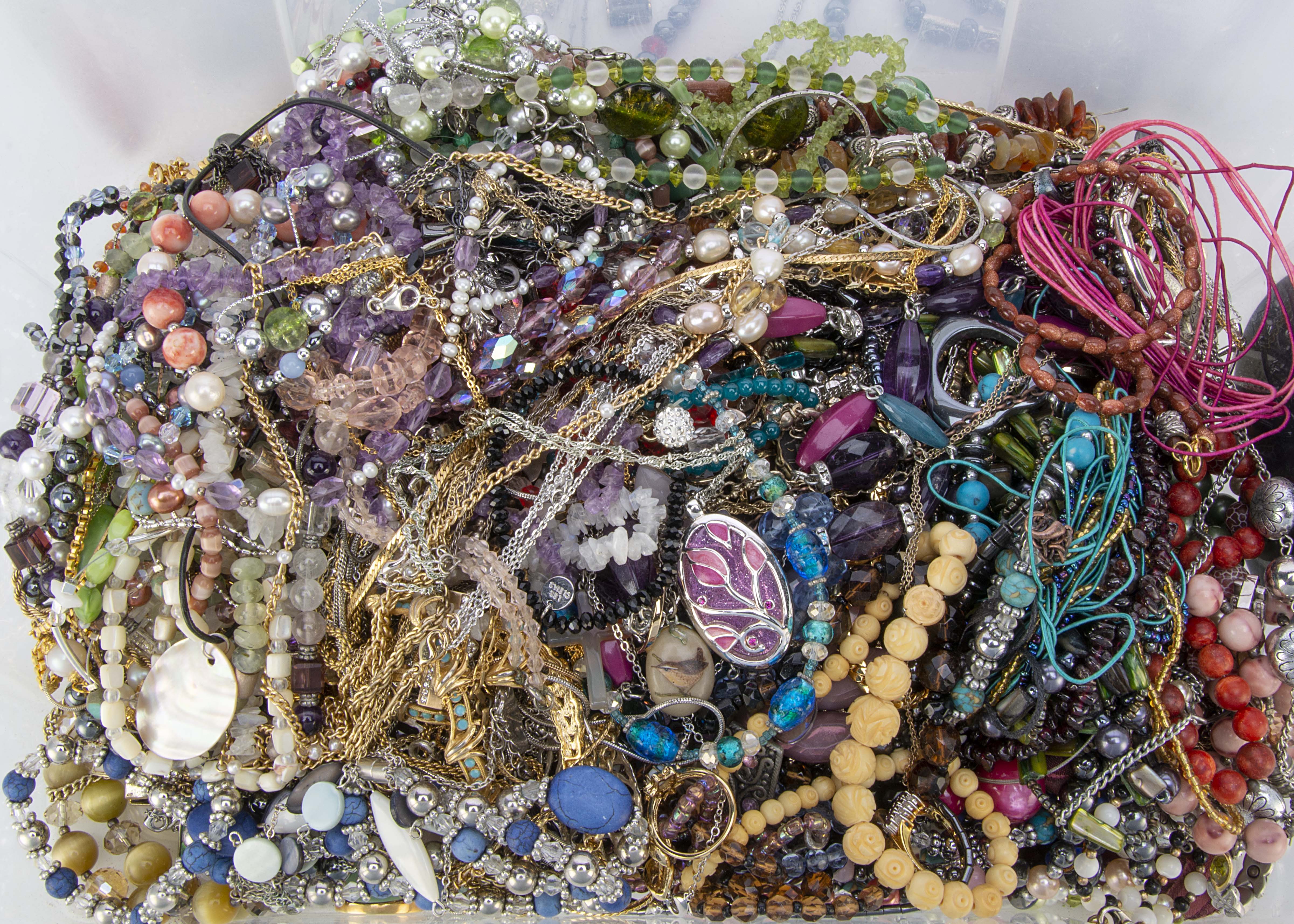 A large collection of costume jewels, including beads, pendants, gilt metal rings and other items (a - Image 2 of 2
