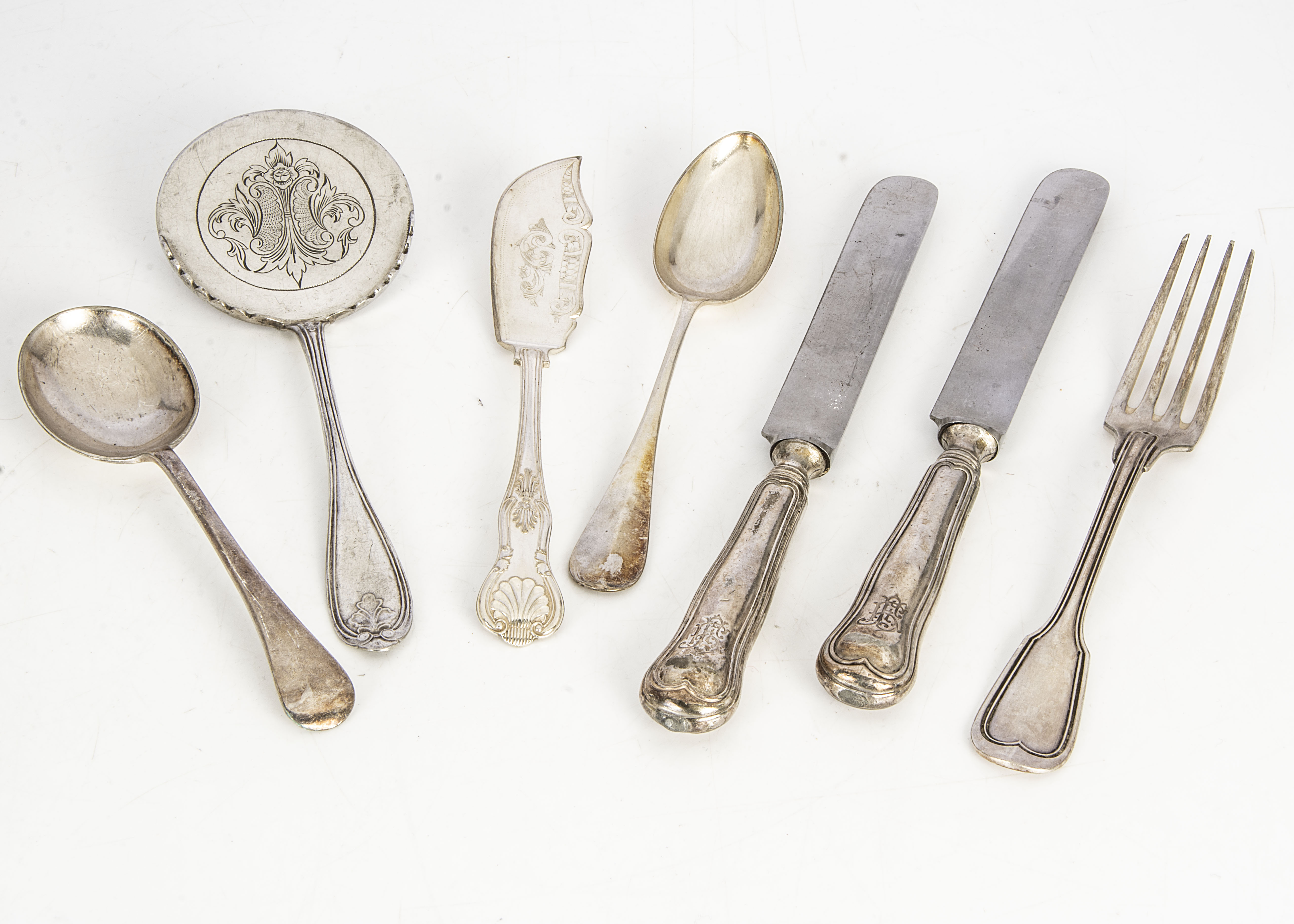 A collection of silver plated flatware and other items