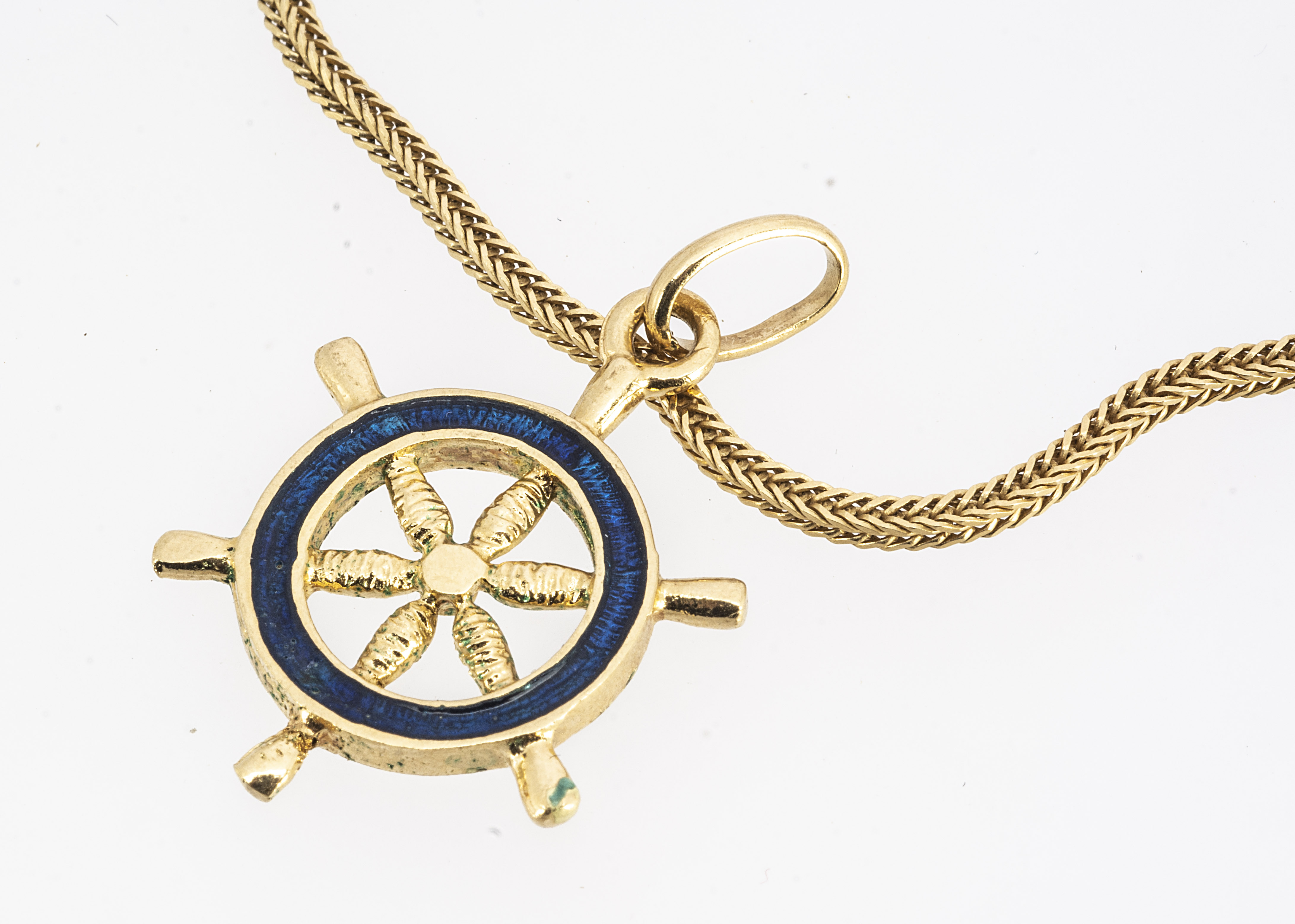 A fine herring bone linked 18ct gold chain, 52 cm max, 8.7g together with a an enamel ship wheel