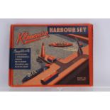 A Kleeware 2354 Harbour Set, comprising a marbled plastic Harbour base with embossed sea