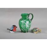 A Mary Gregory green glass jug,