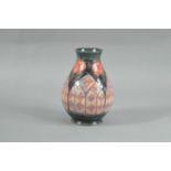 A modern Moorcroft pottery baluster vase,