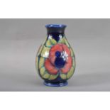 A modern Moorcroft pottery baluster vase,