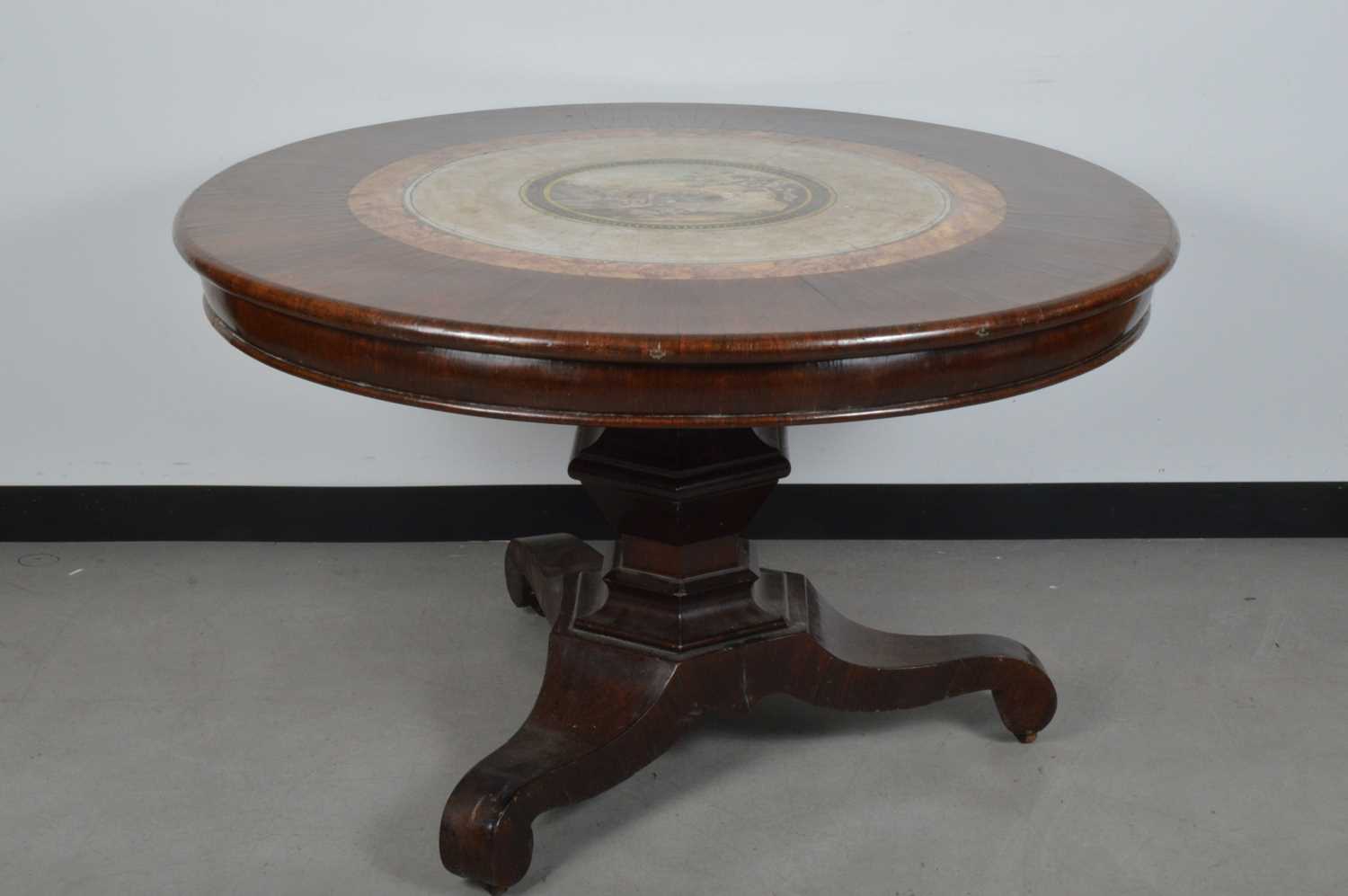 A 19th century rosewood and plaster inlaid circular hall table,