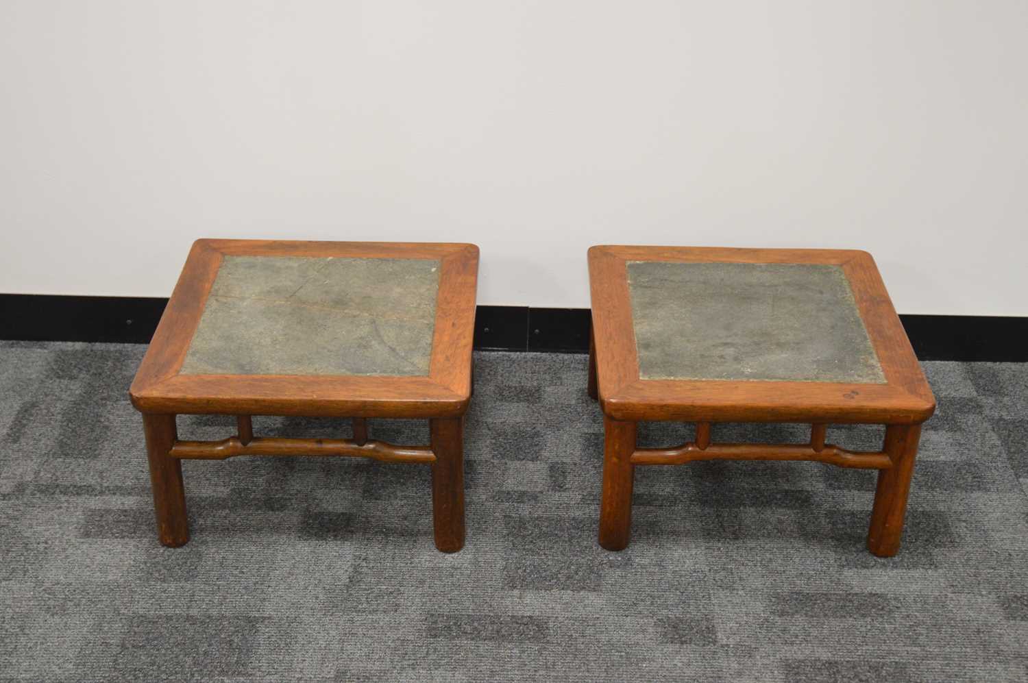 A pair of 20th century Chinese small hardwood tables,