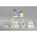 Two Coalport bone china Paddington figurines,