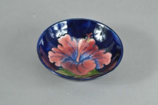 An early Moorcroft pottery footed bowl,
