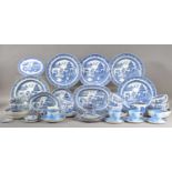 An assorted collection of blue and white ceramics,