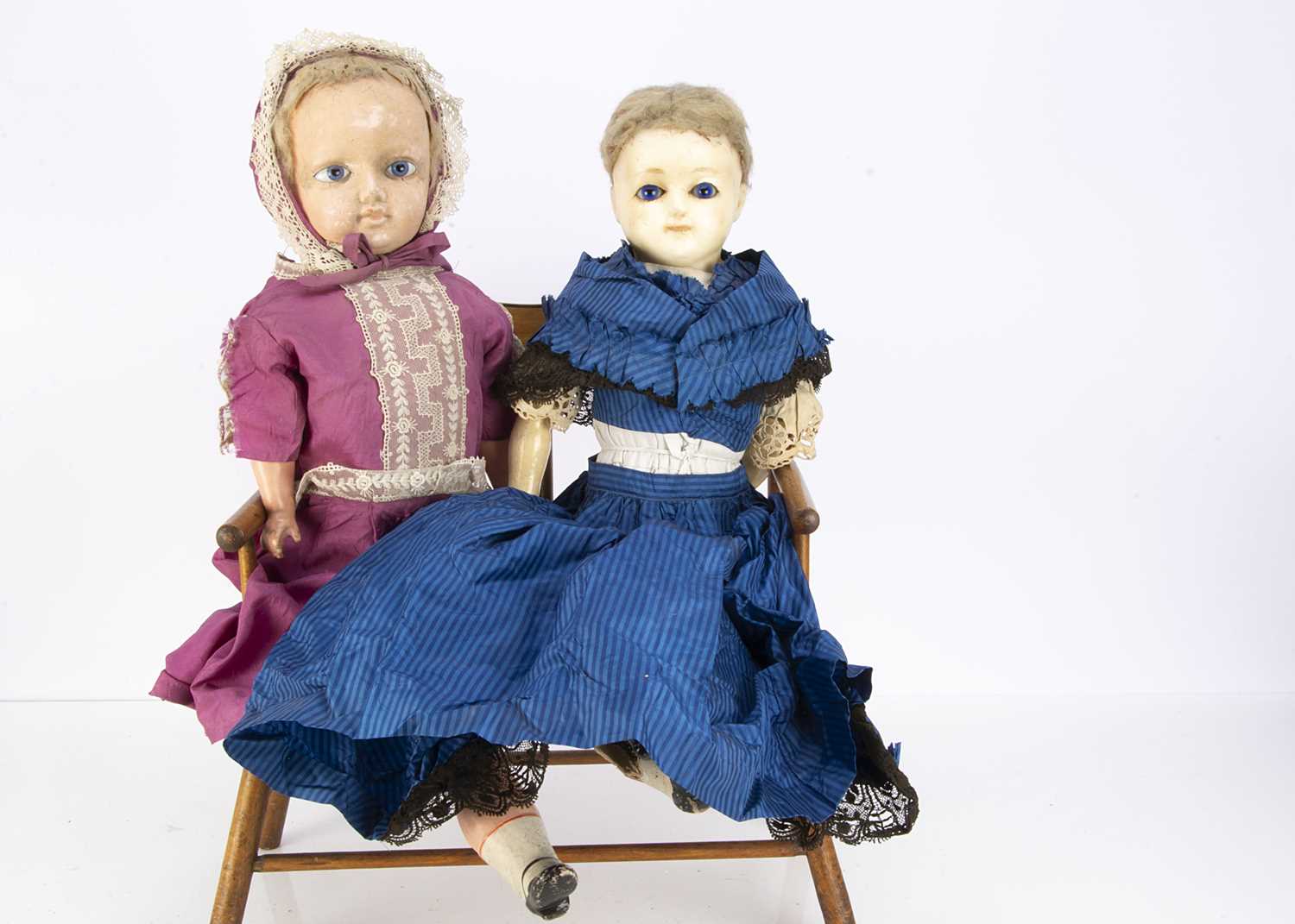 A late 19th century German wax over composition doll with sleeping eyes,