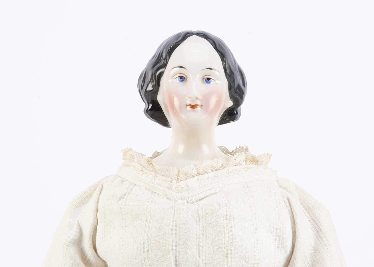 A fine German mid 19th century china shoulder-head doll with elaborate hair, - Image 2 of 2