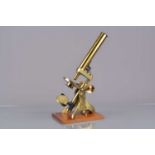 A late 19th Century lacquered brass Compound Monocular Microscope,