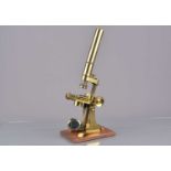 A 19th Century lacquered brass Compound Monocular Microscope,