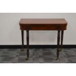 An early 20th century mahogany card/games table,