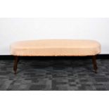 An Edwardian upholstered shaped long stool,