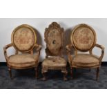 A pair of French gilt upholstered armchairs,