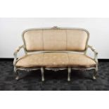 An early 20th century French painted and upholstered two seater settee,