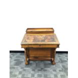 A large early 20th century Davenport desk,