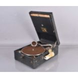 An HMV Model 101M Portable gramophone,