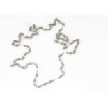 An Art Deco platinum and seed pearl chain,