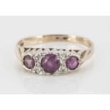 A 9ct gold ruby and diamond dress ring,