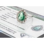 A certificated emerald and diamond platinum pear shaped dress ring,