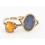 A 9ct gold fire opal single stone dress ring,