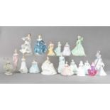 A large collection of ceramic lady figurines,