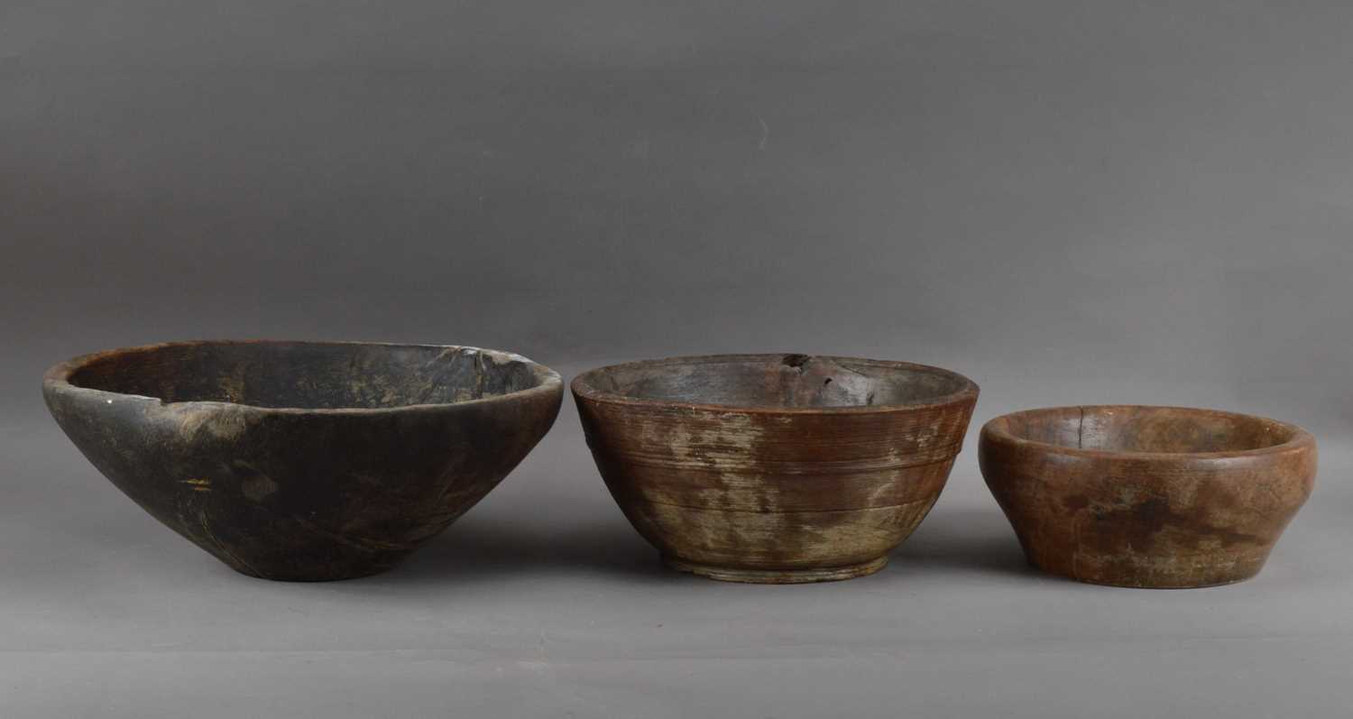 Three treen bowls,