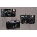 Three Compact Cameras
