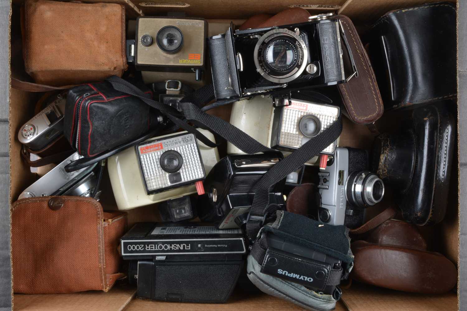 A Tray of Various Cameras,