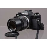 An Olympus OM-2 Spot/Program SLR Camera,
