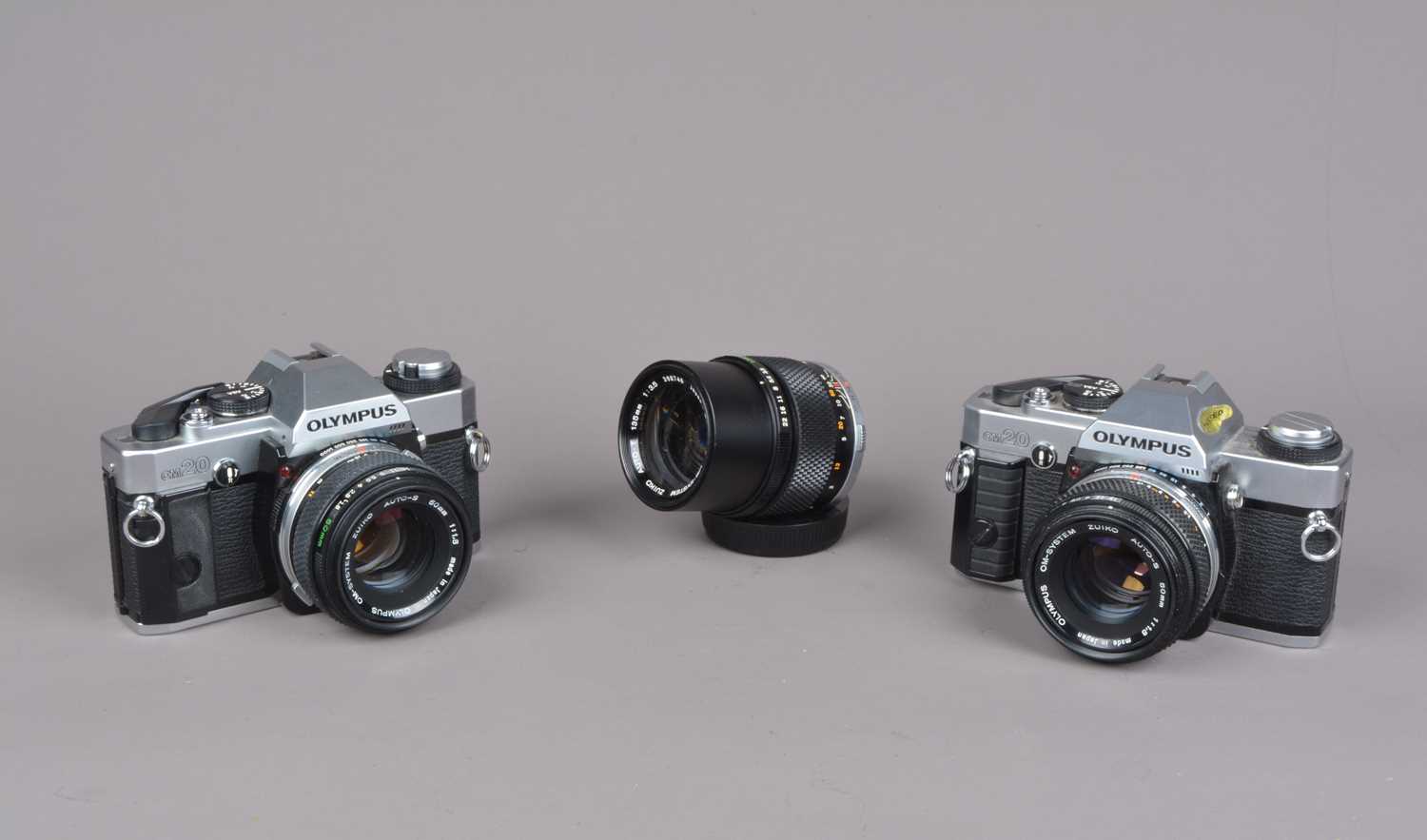 Two Olympus OM20 SLR Cameras,