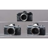 Three Olympus SLR Camera Bodies,