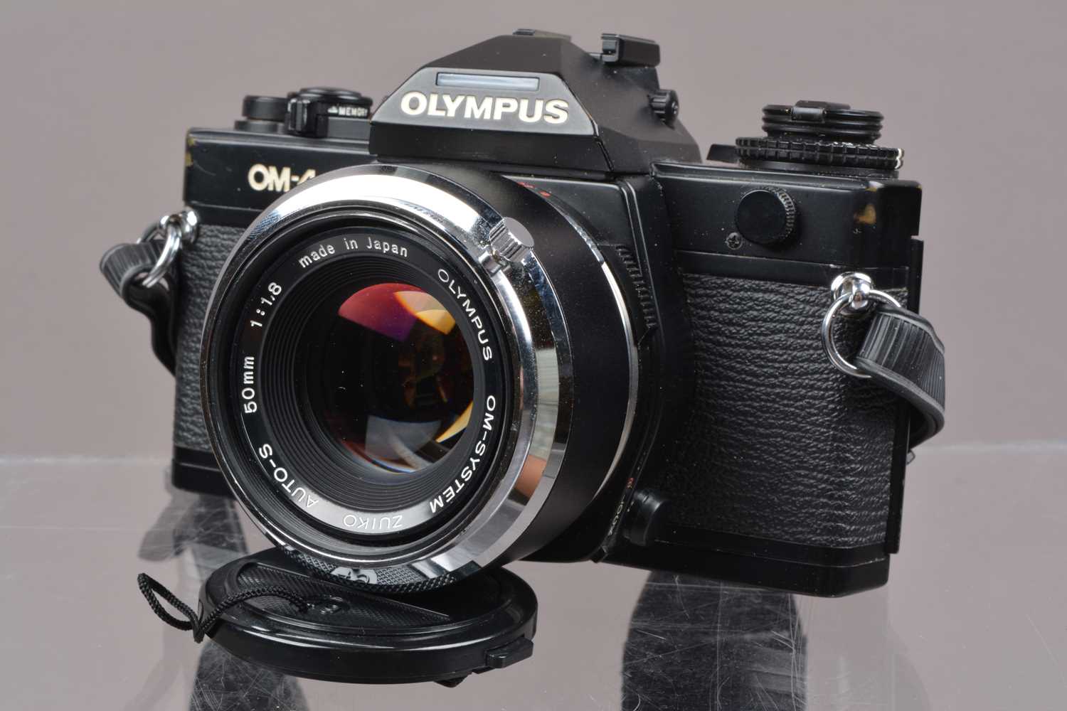 An Olympus OM-4 SLR Camera,