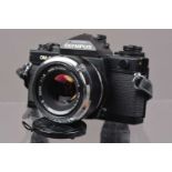 An Olympus OM-4 SLR Camera,